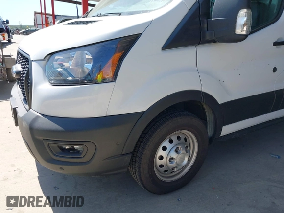 2022 Ford Transit Cargo with VIN 1FTBW3X89NKA69141, listed as a IAAI auction lot 41980864 with 102,721 mi miles and . Bid and sale history available at DreamBid. Image 17.