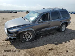2003 Dodge Durango SLT z VIN 1D4HS48N43F577185, wystawiony jako Copart lot #57645345 z przebiegiem Nie podano mil oraz Szkoda całkowita • Salvage title. Historia ofert i sprzedaży dostępna na DreamBid. Obrazek 1.
