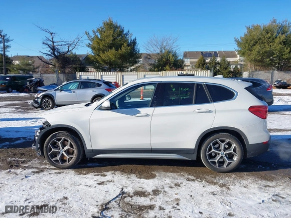 2018 BMW X1 xDrive28i with VIN WBXHT3C36J5L30217, listed as a IAAI auction lot 41237775 with 60,071 mi miles. Bid and sale history available at carsss.com. Image 14.