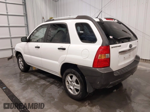 2007 Kia Sportage LX with VIN KNDJF724877399530, listed as a IAAI auction lot 41696698 with 124,967 mi miles. Bid and sale history available at carsss.com. Image 3.