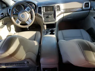2011 Jeep Grand Cherokee Laredo with VIN 1J4RR4GG5BC503705, listed as a Copart auction lot 50014895 with 180,999 mi miles and Salvage title. Bid and sale history available at DreamBid. Image 8.