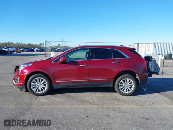 2018 Cadillac XT5 FWD with VIN 1GYKNARS4JZ211455, listed as a IAAI auction lot 41257536 with 102,032 mi miles and . Bid and sale history available at DreamBid. Image 13.