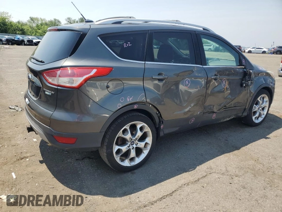 2015 Ford Escape Titanium z VIN 1FMCU9J97FUA38731, wystawiony jako Copart lot #60621085 z przebiegiem 119 704 mil mil oraz Szkoda całkowita • Salvage title. Historia ofert i sprzedaży dostępna na DreamBid. Obrazek 3.