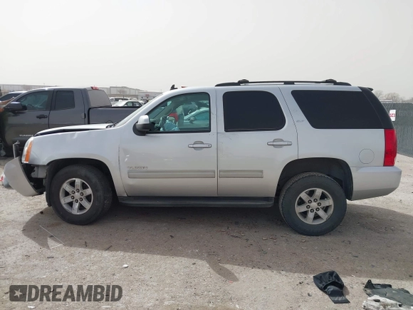2014 GMC Yukon SLT with VIN 1GKS1CE02ER204452, listed as a IAAI auction lot 41804400 with 176,265 mi miles. Bid and sale history available at carsss.com. Image 14.