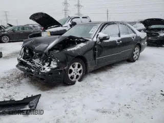 2002 Mercedes-Benz E-Class with VIN WDBJF65J62B473981, listed as a Copart auction lot 89251985 with 87,876 mi miles and Salvage Title. Bid and sale history available at carsss.com. Image 1.