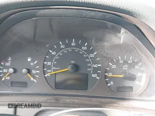 2001 Mercedes-Benz E-Class with VIN WDBJH65JX1B290284, listed as a IAAI auction lot 41713265 with 1 mi miles. Bid and sale history available at carsss.com. Image 7.