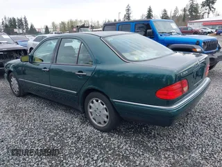 1998 Mercedes-Benz E-Class with VIN WDBJF65FXWA589630, listed as a IAAI auction lot 41990725 with 102,149 mi miles. Bid and sale history available at carsss.com. Image 3.