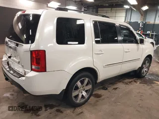 2015 Honda Pilot Touring with VIN 5FNYF4H98FB001841, listed as a IAAI auction lot 41955645 with 109,818 mi miles. Bid and sale history available at carsss.com. Image 4.