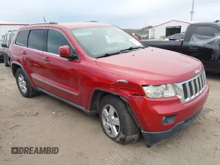 2011 Jeep Grand Cherokee Laredo z VIN 1J4RR4GG4BC552507, wystawiony jako IAAI lot #41470982 z przebiegiem 156 269 mil mil oraz . Historia ofert i sprzedaży dostępna na DreamBid. Obrazek 1.