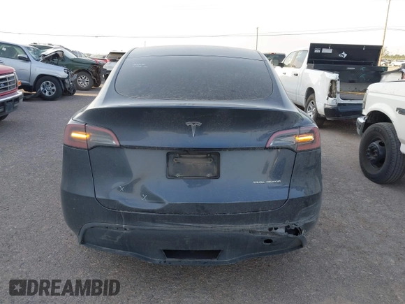 2023 Tesla Model Y Long Range with VIN 7SAYGDEE1PA053683, listed as a IAAI auction lot 42124517 with 32,295 mi miles. Bid and sale history available at carsss.com. Image 15.