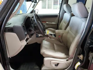 2006 Jeep Commander Limited with VIN 1J8HG58N96C300664, listed as a Copart auction lot 56022715 with 203,172 mi miles and Salvage title. Bid and sale history available at DreamBid. Image 7.