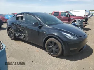 2023 Tesla Model Y Long Range z VIN 7SAYGDEE9PA115279, wystawiony jako Copart lot #55018275 z przebiegiem 43 026 mil mil oraz Szkoda całkowita • Salvage title. Historia ofert i sprzedaży dostępna na DreamBid. Obrazek 4.