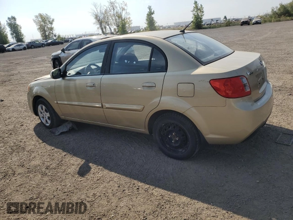 2011 Kia Rio with VIN KNADH4B38B6725531, listed as a Copart auction lot 72389974 with 124,315 mi miles and Salvage Title. Bid and sale history available at DreamBid. Image 2.