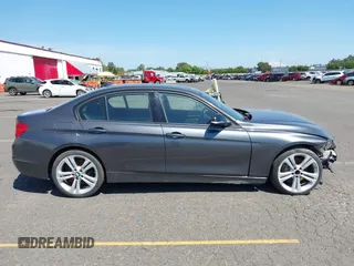 2012 BMW 3 Series 335i with VIN WBA3A9C5XCF077642, listed as a IAAI auction lot 42385611 with 119,251 mi miles and . Bid and sale history available at DreamBid. Image 13.