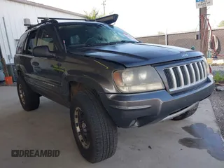 2004 Jeep Grand Cherokee Laredo with VIN 1J4GW48N14C346920, listed as a IAAI auction lot 42595173 with 254,880 mi miles and . Bid and sale history available at DreamBid. Image 1.