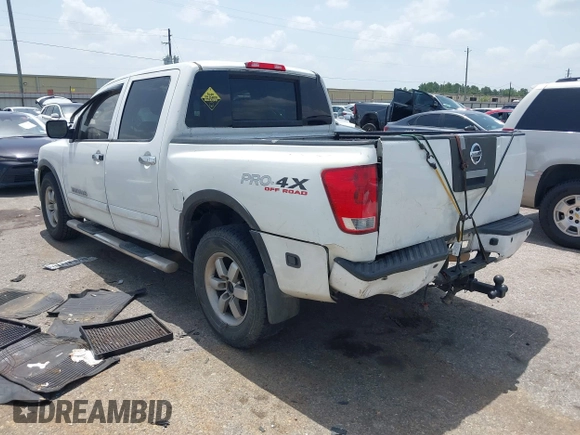 2012 Nissan Titan SL with VIN 1N6BA0EC1CN326919, listed as a IAAI auction lot 42630368 with 230,215 mi miles and . Bid and sale history available at DreamBid. Image 3.