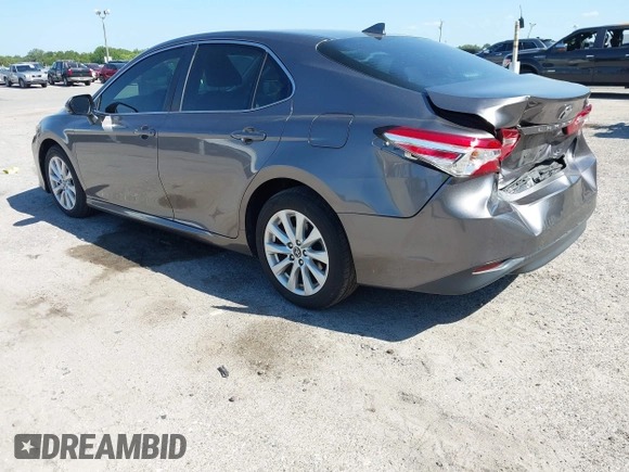 2019 Toyota Camry LE with VIN 4T1B11HK4KU286959, listed as a IAAI auction lot 42063344 with 92,481 mi miles and . Bid and sale history available at DreamBid. Image 3.