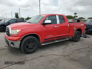 2011 Toyota Tundra with VIN 5TFRM5F16BX033989, listed as a Copart auction lot 62153015 with 132,149 mi miles and Clean title. Bid and sale history available at DreamBid. Image 1.
