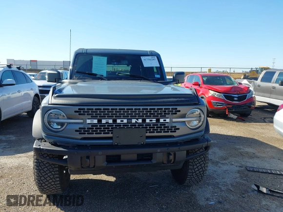 2024 Ford Bronco Badlands z VIN 1FMEE9BP2RLA26774, wystawiony jako IAAI lot #41756285 z przebiegiem 5875 mil mil oraz . Historia ofert i sprzedaży dostępna na DreamBid. Obrazek 13.