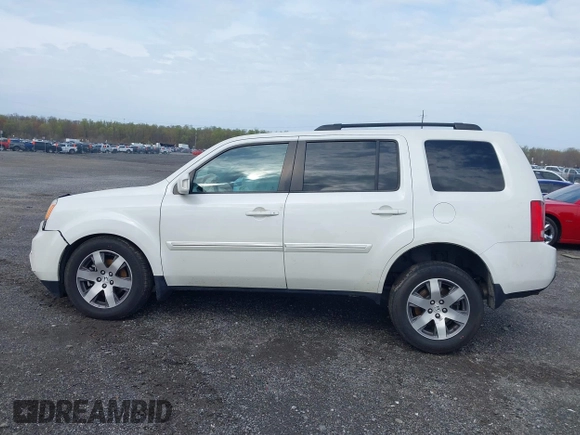 2014 Honda Pilot Touring with VIN 5FNYF4H97EB046879, listed as a IAAI auction lot 42017280 with 167,564 mi miles and . Bid and sale history available at carsss.com. Image 15.