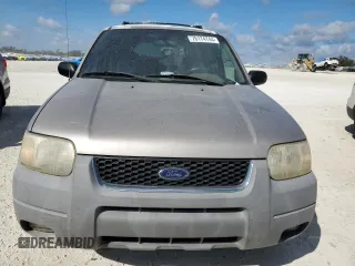 2001 Ford Escape XLT with VIN 1FMCU04101KF61126, listed as a Copart auction lot 76174744 with 0 mi miles and Salvage Title. Bid and sale history available at carsss.com. Image 5.