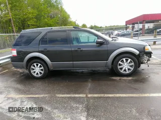 2008 Ford Taurus X SEL z VIN 1FMDK02W08GA28649, wystawiony jako IAAI lot #42026925 z przebiegiem 191 857 mil mil oraz . Historia ofert i sprzedaży dostępna na DreamBid. Obrazek 14.