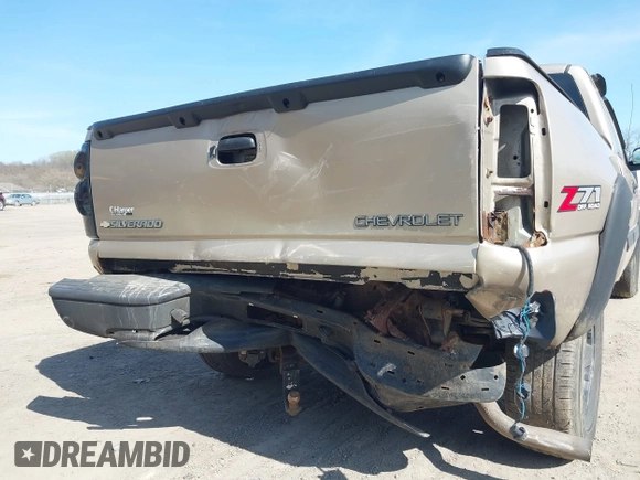 2005 Chevrolet Silverado 1500 Z71 with VIN 2GCEK19B951171707, listed as a IAAI auction lot 42062775 with 129,044 mi miles and . Bid and sale history available at DreamBid. Image 6.