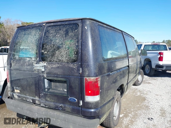 1999 Ford Econoline Cargo with VIN 1FTRE1422XHA33460, listed as a IAAI auction lot 41326443 with 119,294 mi miles. Bid and sale history available at carsss.com. Image 4.