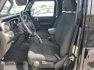 2019 Jeep Wrangler Unlimited Sport S with VIN 1C4HJXDG2KW570078, listed as a Copart auction lot 51119485 with 65,860 mi miles and Salvage title. Bid and sale history available at DreamBid. Image 7.