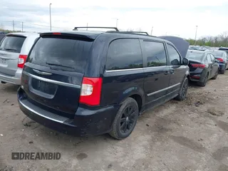 2011 Chrysler Town & Country Touring L with VIN 2A4RR8DG8BR645498, listed as a IAAI auction lot 42070744 with 173,661 mi miles and . Bid and sale history available at carsss.com. Image 4.