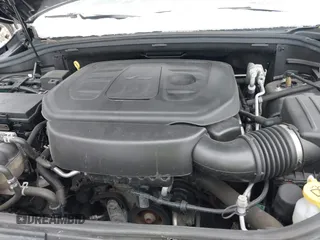 2019 Jeep Grand Cherokee Summit with VIN 1C4RJFJGXKC669686, listed as a IAAI auction lot 41465553 with 72,127 mi miles. Bid and sale history available at carsss.com. Image 10.