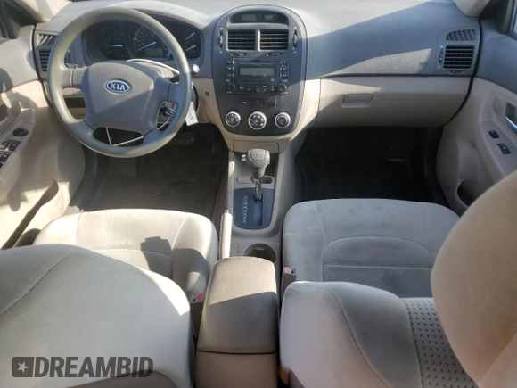 2009 Kia Spectra LX z VIN KNAFE222995618257, wystawiony jako Copart lot #56179025 z przebiegiem 270 087 mil mil oraz Szkoda całkowita • Salvage title. Historia ofert i sprzedaży dostępna na DreamBid. Obrazek 8.