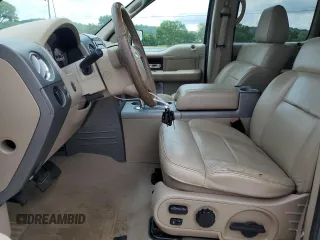 2005 Ford F-150 XLT with VIN 1FTPW14515KE37624, listed as a Copart auction lot 60975915 with 118,976 mi miles and Salvage title. Bid and sale history available at DreamBid. Image 7.