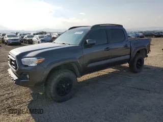 2021 Toyota Tacoma SR with VIN 3TMCZ5AN9MM447746, listed as a Copart auction lot 65197654 with 53,869 mi miles and Salvage title. Bid and sale history available at DreamBid. Image 1.