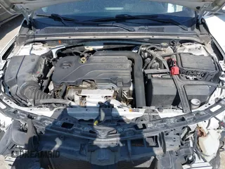 2018 Chevrolet Malibu LT z VIN 1G1ZD5ST6JF238524, wystawiony jako IAAI lot #41701717 z przebiegiem 167 986 mil mil oraz . Historia ofert i sprzedaży dostępna na DreamBid. Obrazek 10.