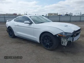 2019 Ford Mustang EcoBoost with VIN 1FA6P8THXK5143703, listed as a IAAI auction lot 42056207 with 71,251 mi miles and . Bid and sale history available at carsss.com. Image 14.
