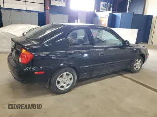2005 Hyundai Accent GLS with VIN KMHCG35C95U327960, listed as a Copart auction lot 77151314 with 101,556 mi miles and Clean Title. Bid and sale history available at carsss.com. Image 3.