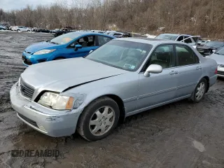 2002 Acura RL with VIN JH4KA96642C012013, listed as a Copart auction lot 46262295 with 75,259 mi miles and Salvage title. Bid and sale history available at DreamBid. Image 1.