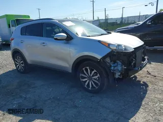 2019 Kia Sportage EX z VIN KNDPNCAC4K7535031, wystawiony jako IAAI lot #42135676 z przebiegiem 94 810 mil mil oraz . Historia ofert i sprzedaży dostępna na DreamBid. Obrazek 1.