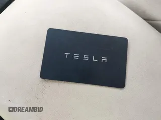 2022 Tesla Model Y Long Range with VIN 7SAYGAEE8NF431786, listed as a IAAI auction lot 41750353 with 67,846 mi miles and . Bid and sale history available at carsss.com. Image 11.