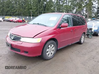 2003 Honda Odyssey EX z VIN 5FNRL18683B080893, wystawiony jako IAAI lot #41840931 z przebiegiem 218 794 mil mil oraz . Historia ofert i sprzedaży dostępna na DreamBid. Obrazek 2.