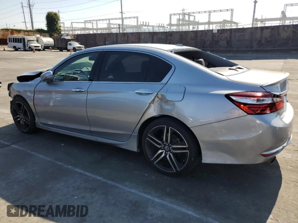 2017 Honda Accord Touring with VIN 1HGCR3F91HA016581, listed as a Copart auction lot 60517085 with 99,182 mi miles and Salvage title. Bid and sale history available at DreamBid. Image 2.