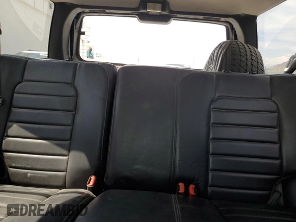 1996 Jeep Grand Cherokee Laredo z VIN 1J4GZ58S8TC222435, wystawiony jako Copart lot #62347665 z przebiegiem 202 125 mil mil oraz Czysty tytuł • Clean title. Historia ofert i sprzedaży dostępna na DreamBid. Obrazek 10.