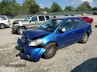 2012 Suzuki SX4 LE with VIN JS2YC5A31C6303361, listed as a Copart auction lot 74329394 with 136,420 mi miles and Salvage Title. Bid and sale history available at carsss.com. Image 11.