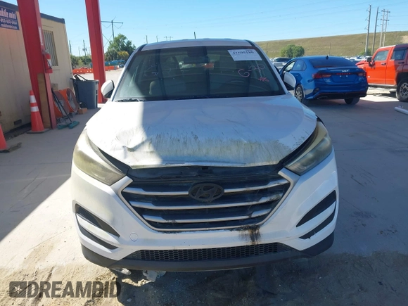 2017 Hyundai Tucson SE with VIN KM8J23A45HU328404, listed as a IAAI auction lot 41695180 with 120,458 mi miles. Bid and sale history available at carsss.com. Image 12.