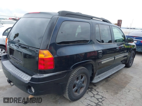 2003 GMC Envoy XL SLE with VIN 1GKES16S436167921, listed as a IAAI auction lot 42028489 with 226,750 mi miles. Bid and sale history available at carsss.com. Image 4.