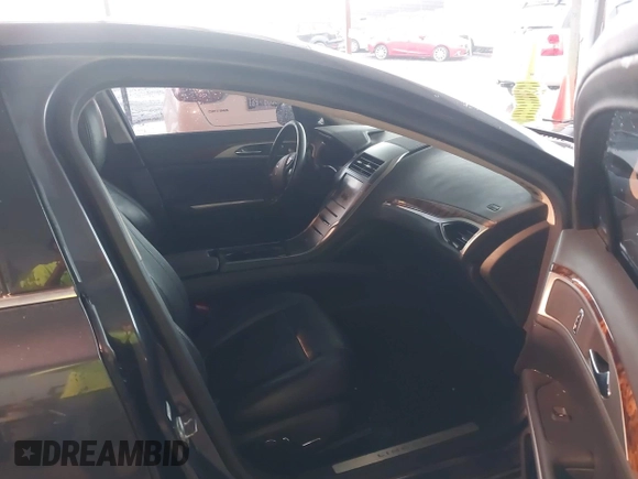 2014 Lincoln MKZ with VIN 3LN6L2J90ER812203, listed as a IAAI auction lot 42078804 with 139,238 mi miles. Bid and sale history available at carsss.com. Image 5.