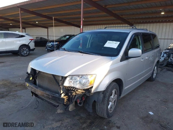 2012 Dodge Grand Caravan SXT with VIN 2C4RDGCG8CR296361, listed as a IAAI auction lot 41657743 with 205,531 mi miles. Bid and sale history available at carsss.com. Image 6.