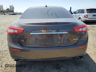 2015 Maserati Ghibli S Q4 z VIN ZAM57RTA7F1130656, wystawiony jako Copart lot #56363915 z przebiegiem 45 397 mil mil oraz Szkody całkowita. Historia ofert i sprzedaży dostępna na DreamBid. Obrazek 6.