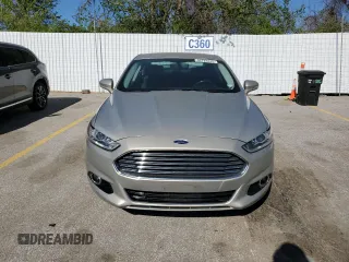 2016 Ford Fusion Titanium Hybrid with VIN 3FA6P0RU0GR153294, listed as a Copart auction lot 52723515 with 117,570 mi miles and Salvage title. Bid and sale history available at DreamBid. Image 5.